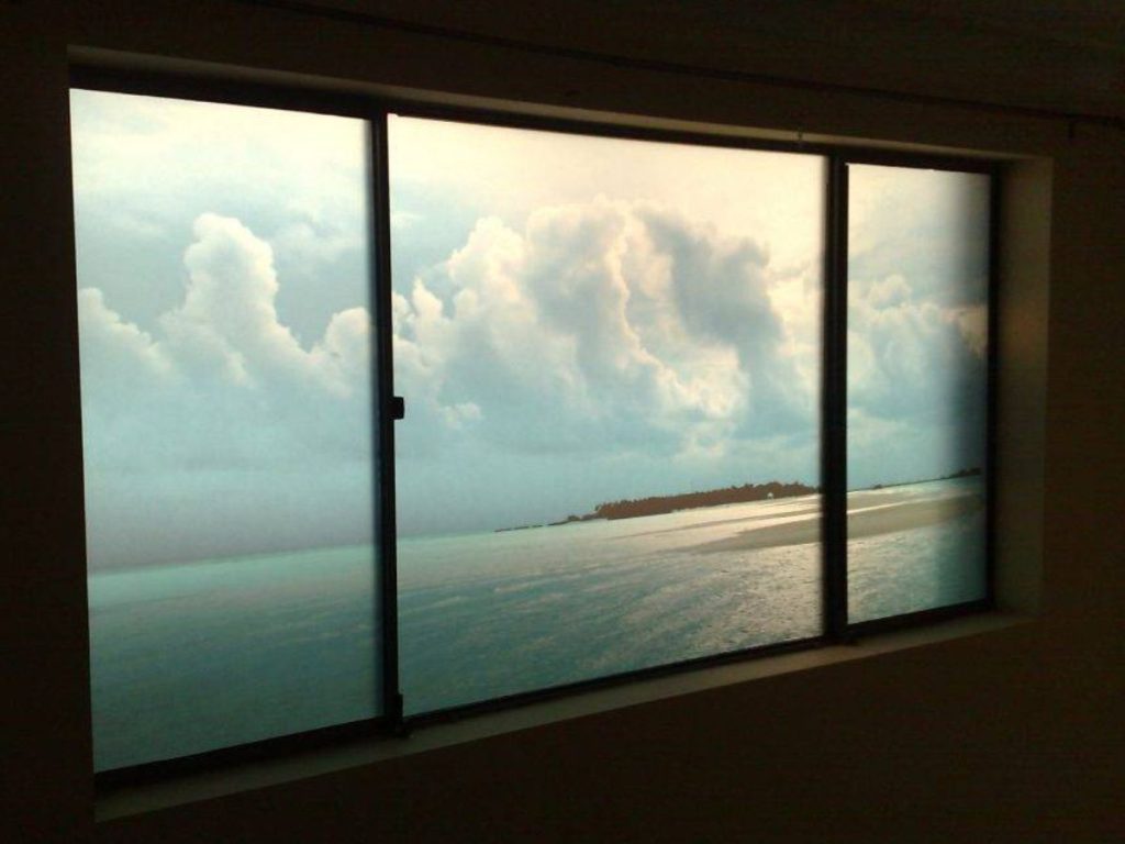 frosted glass beach print on window 