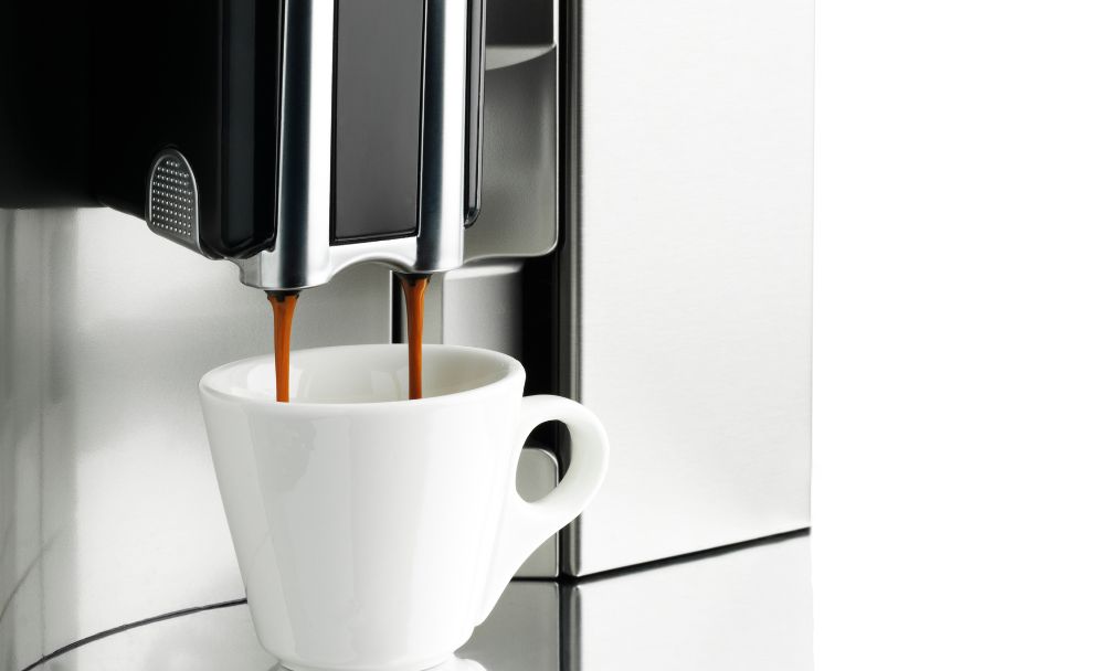coffee being poured from a machine